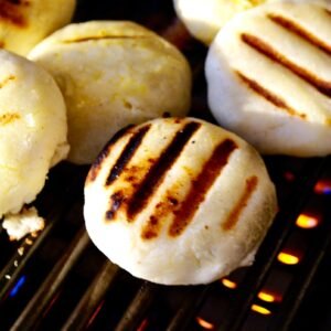 white and brown pastry on black tray
